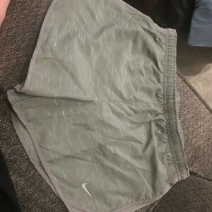 Nike brand new/ tags Standard fit youth large/ womens small has built in liner